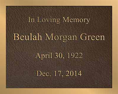 bronze memorial plaque with color photo